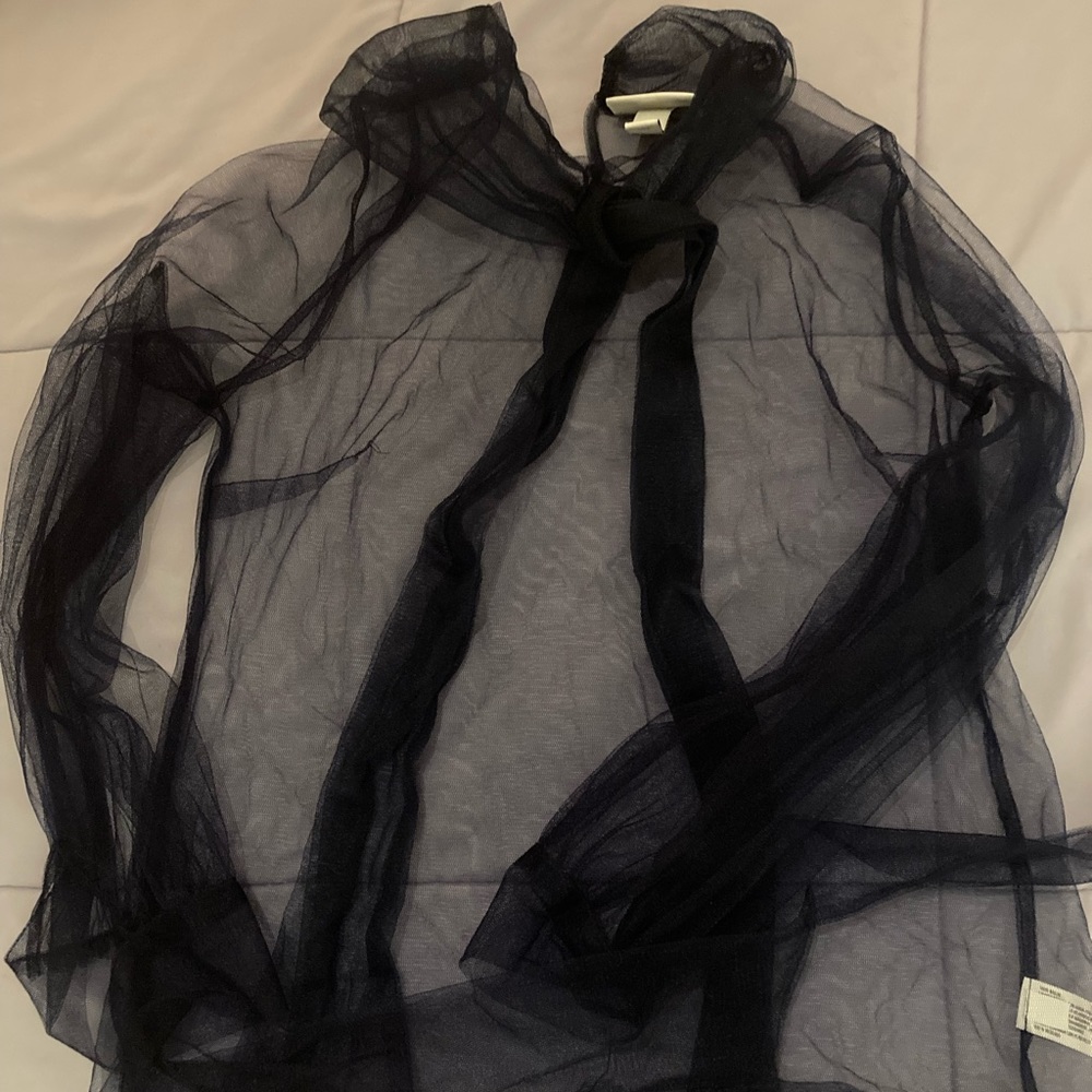 Never worn, two-piece navy sheer top and mini skirt, skirt length 20”